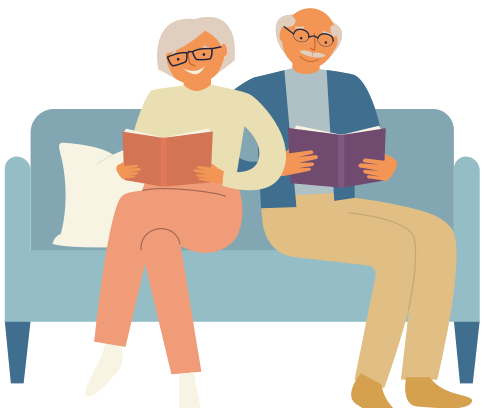 Couple sitting on a couch reading books together
